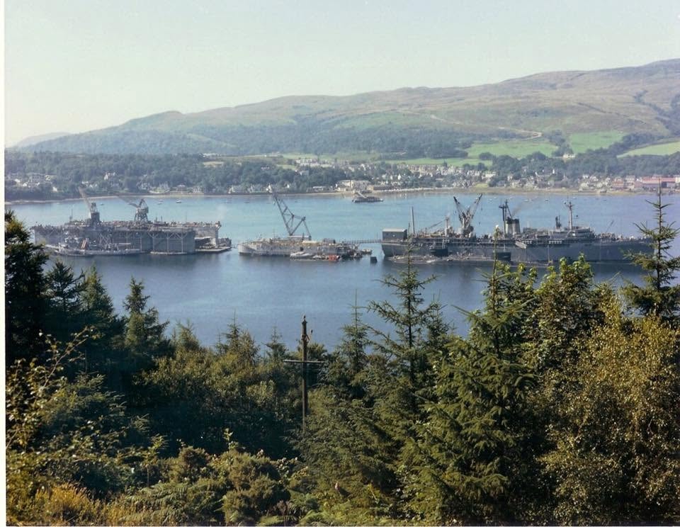 U.S. Navy ships and floating tender moored in Holy Loch, Scotland