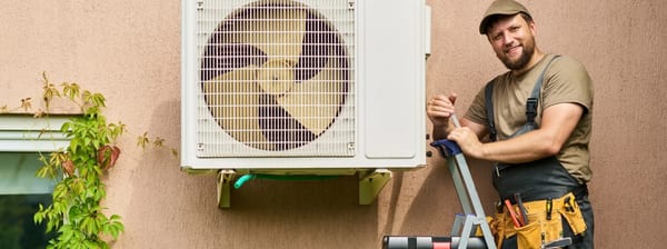 HVAC technician performing a preventive maintenance inspection